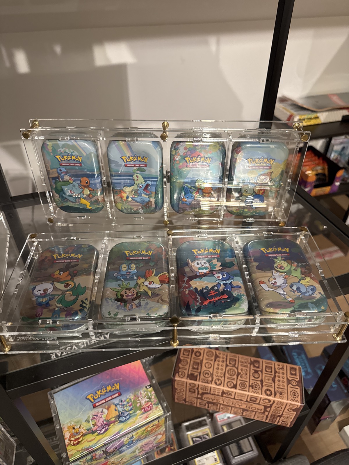 Pokémon Celebrations – Mini Tin Artwork Set (8 Tins, EN)